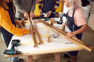 close-up-of-team-in-workshop-assembling-hand-built