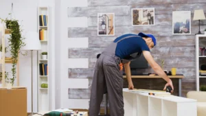 furniture-assembly-worker-standing-reading